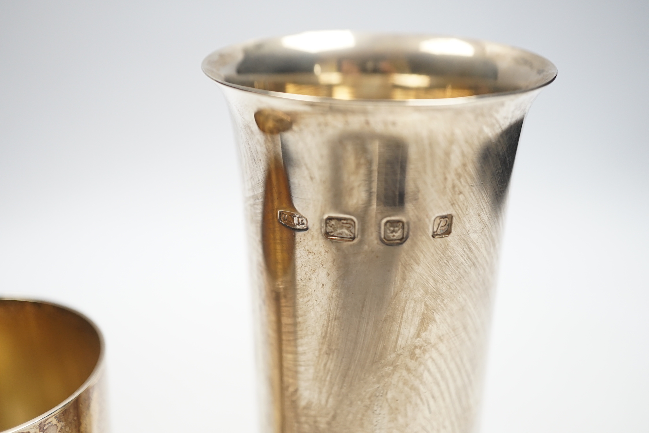 Two Elizabeth II silver cylinder vases, by Christopher Nigel Lawrence, including antler range vase, with certificate, 12.3cm, Edinburgh, 1970, the taller vase, London, 1970, 15.6oz.